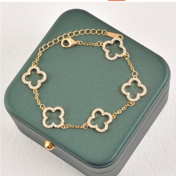 Jewelry - Bracelet- Golden Tone stainless steel Cubic Zirconia Clover Design bracelet.